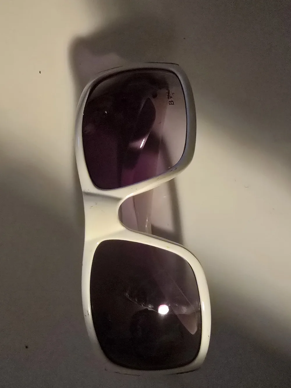 Bulgari White Frame Sunglasses with Dark Purple Lenses